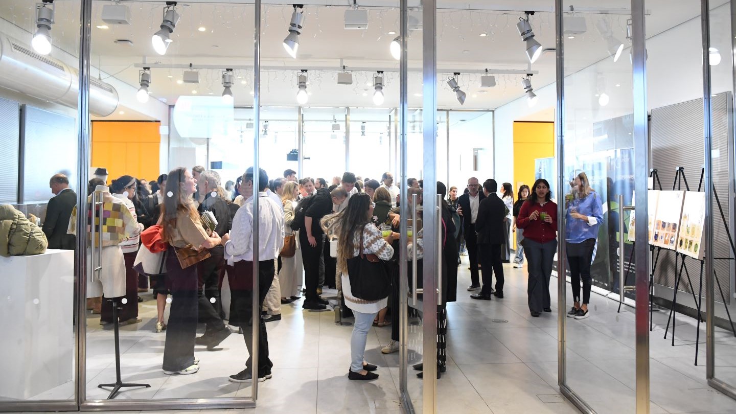 image of large crowd of visitors and participants in exhibition