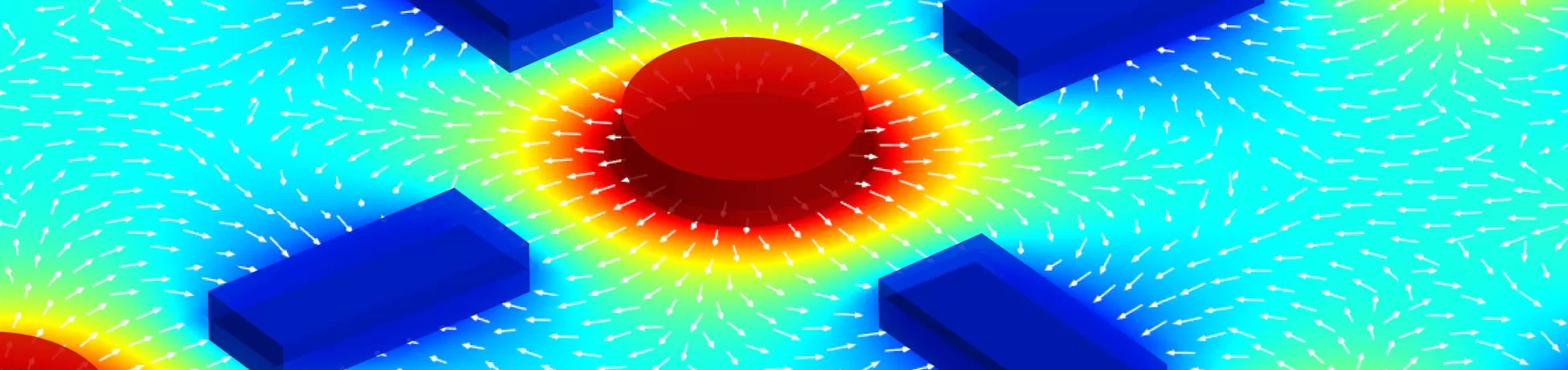 Scientific visualization featuring red circular structures and blue rectangular elements surrounded by colorful field gradients and directional vector arrows.