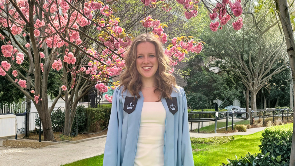 Sydney England in commencement regalia
