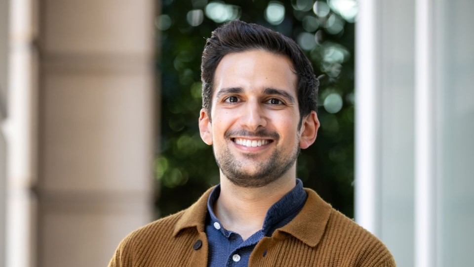 Santiago Correa smiling for a headshot